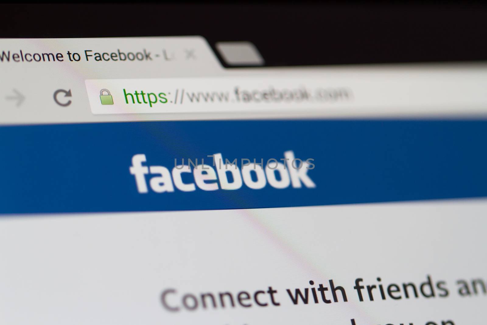 ISTANBUL, TURKEY - MARCH 16, 2013: Photo of Facebook.com home page and logo on tablet. Facebook is the largest social media network and owned by Facebook, Inc.