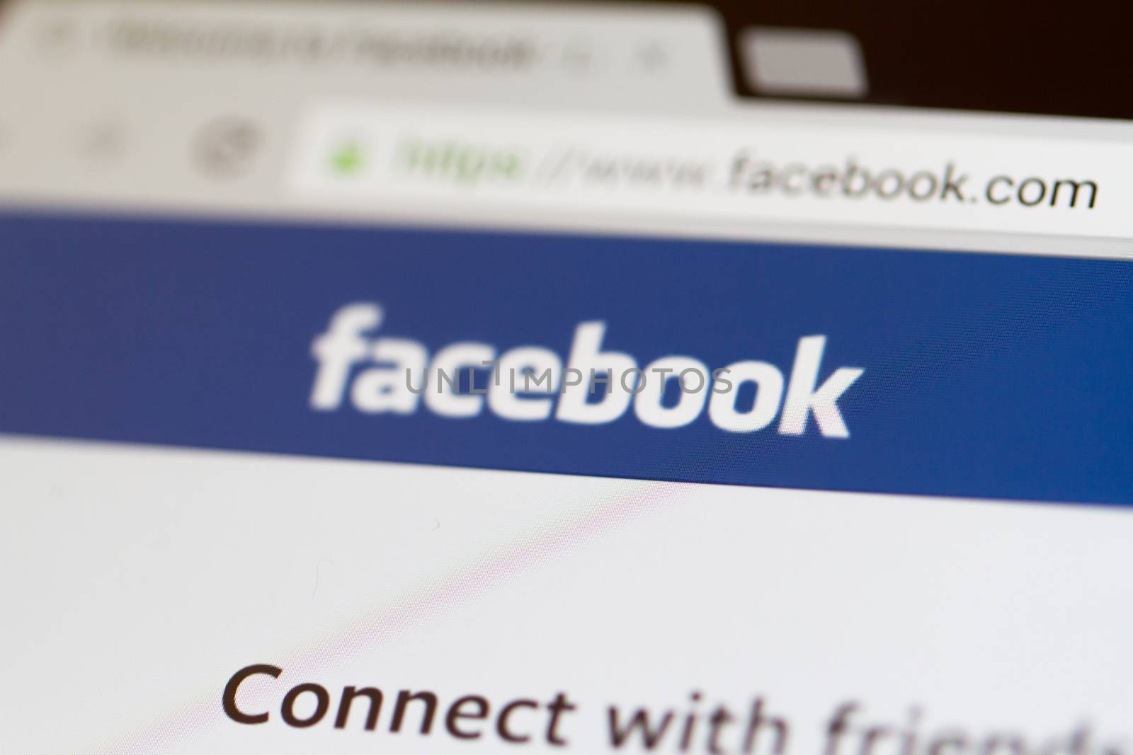 ISTANBUL, TURKEY - MARCH 16, 2013: Photo of Facebook.com home page on tablet. Facebook is the largest social media network and owned by Facebook, Inc.