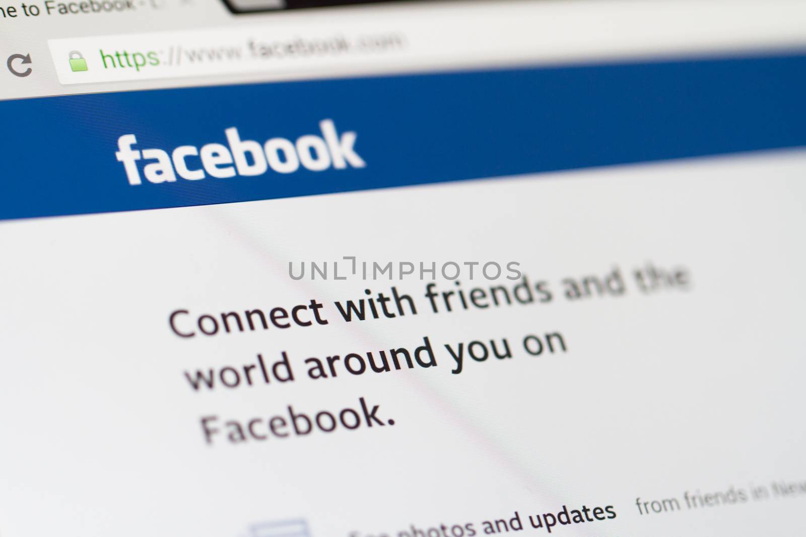 ISTANBUL, TURKEY - MARCH 16, 2013: Photo of Facebook.com home page on tablet. Facebook is the largest social media network and owned by Facebook, Inc.