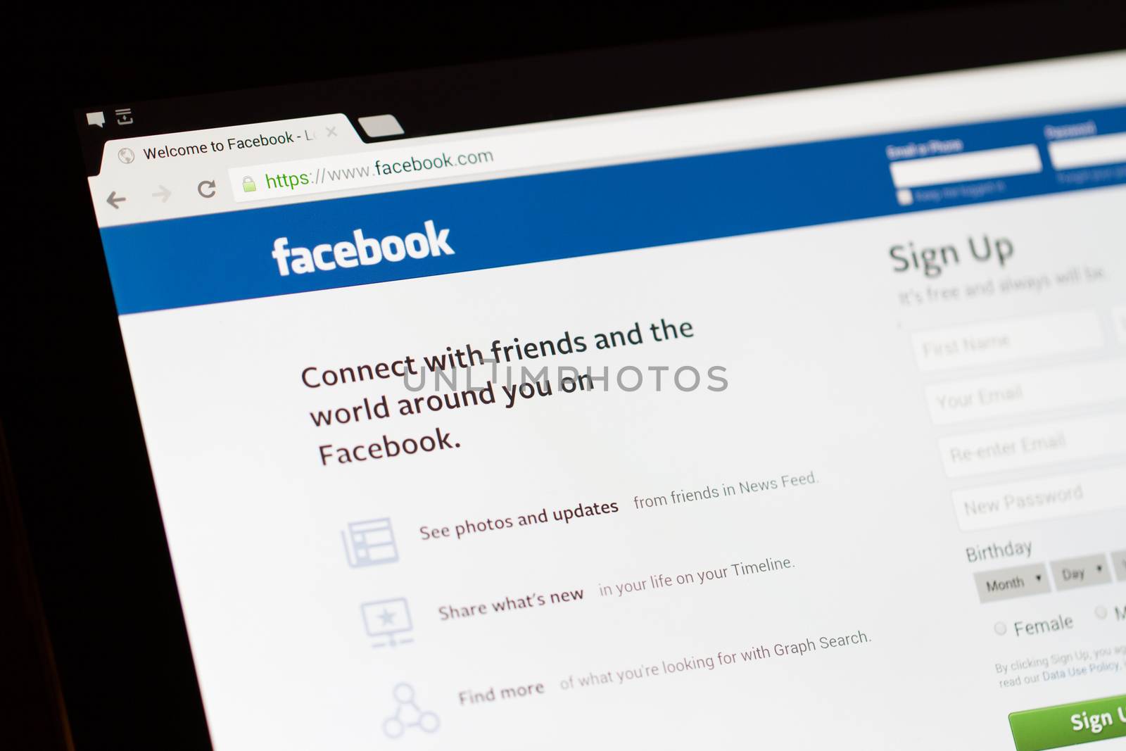 ISTANBUL, TURKEY - MARCH 16, 2013: Photo of Facebook.com home page on tablet. Facebook is the largest social media network and owned by Facebook, Inc.