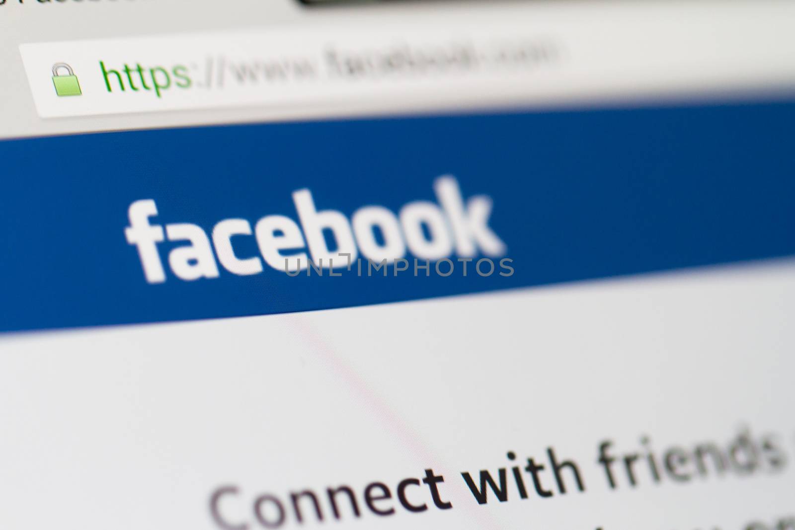 ISTANBUL, TURKEY - MARCH 16, 2013: Photo of Facebook.com home page on tablet. Facebook is the largest social media network and owned by Facebook, Inc.