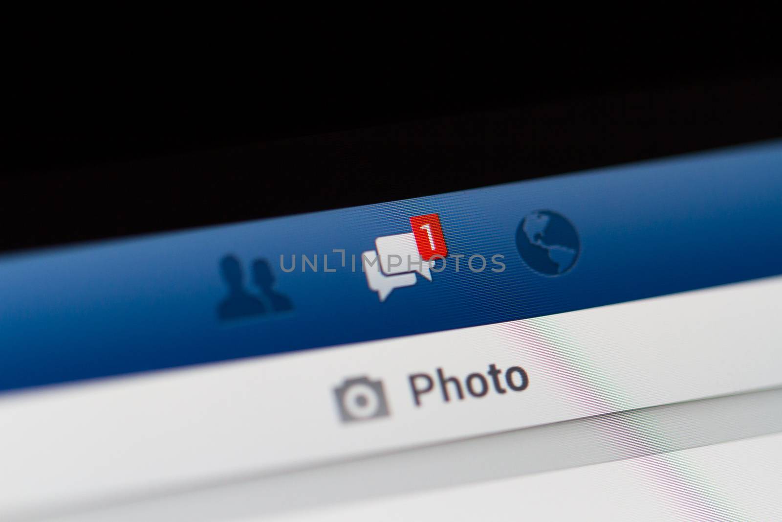 ISTANBUL, TURKEY - MARCH 16, 2013: Photo of Facebook notifications of messages on tablet.  Facebook is the largest social media network and owned by Facebook, Inc.