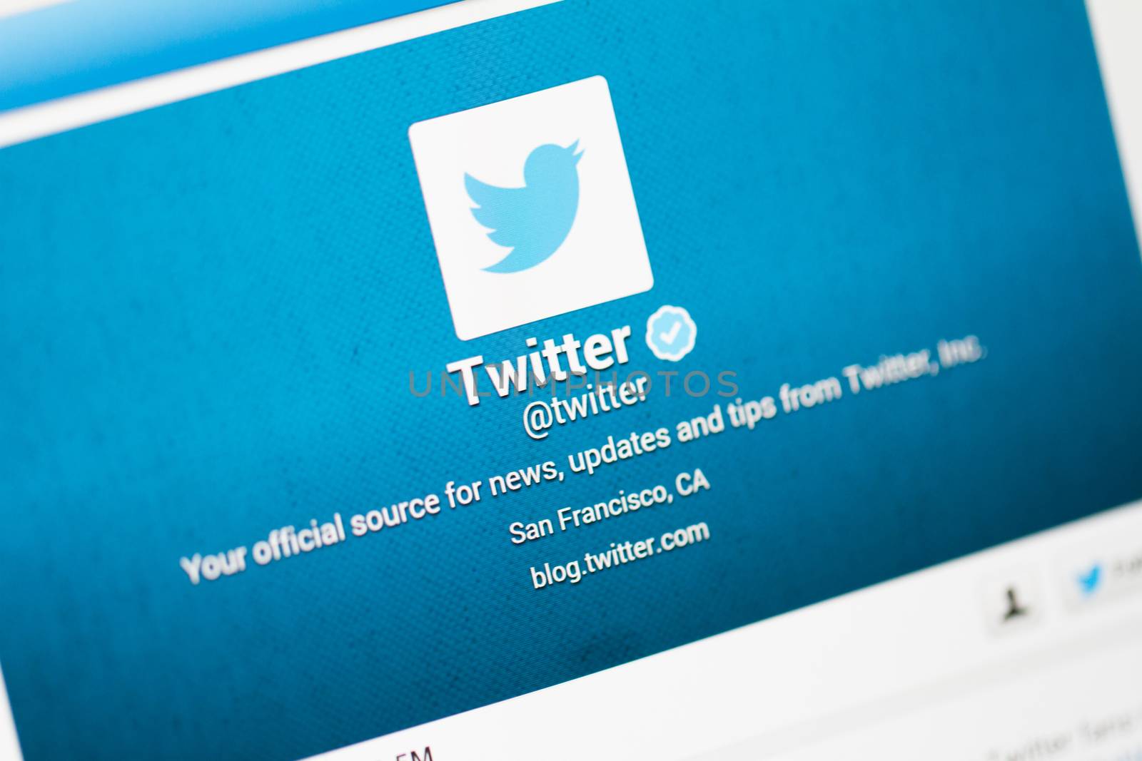 ISTANBUL, TURKEY - MARCH 22, 2013: Photo of Twitter account with user and profile name on tablet.  Twitter is one of the most used social networking and microblogging web site.