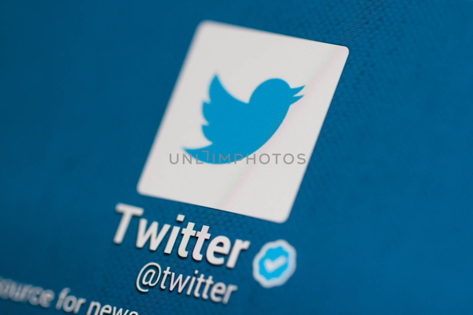 ISTANBUL, TURKEY - MARCH 22, 2013: Photo of Twitter account with user and profile name on tablet.  Twitter is one of the most used social networking and microblogging web site.