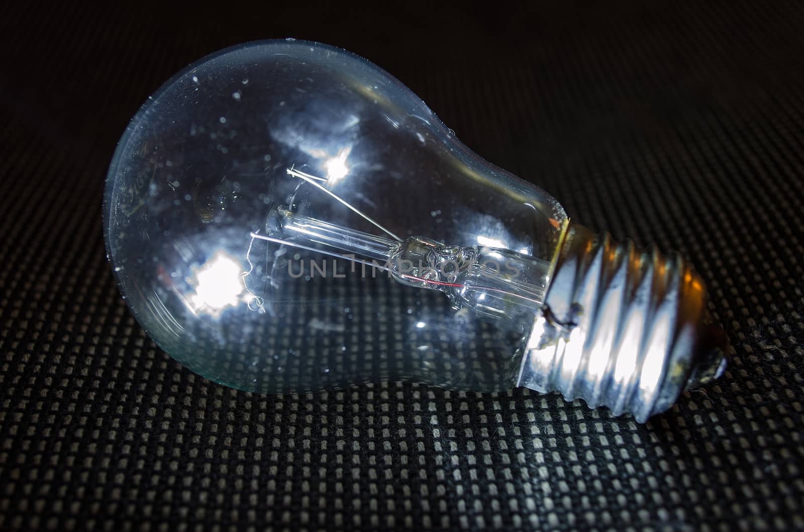 Light bulb on dark background.