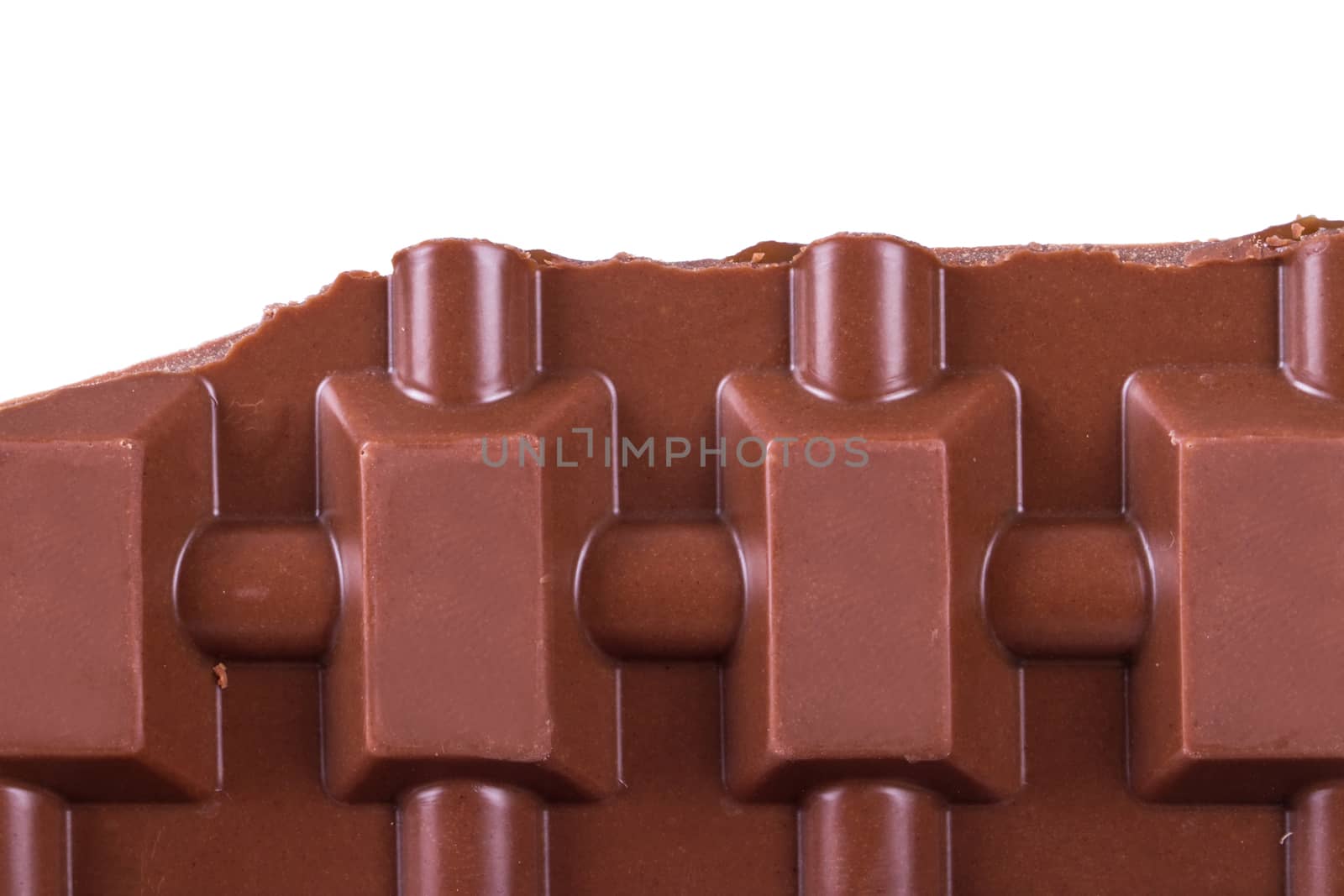 Detail view of chocolate, isolated on white background.