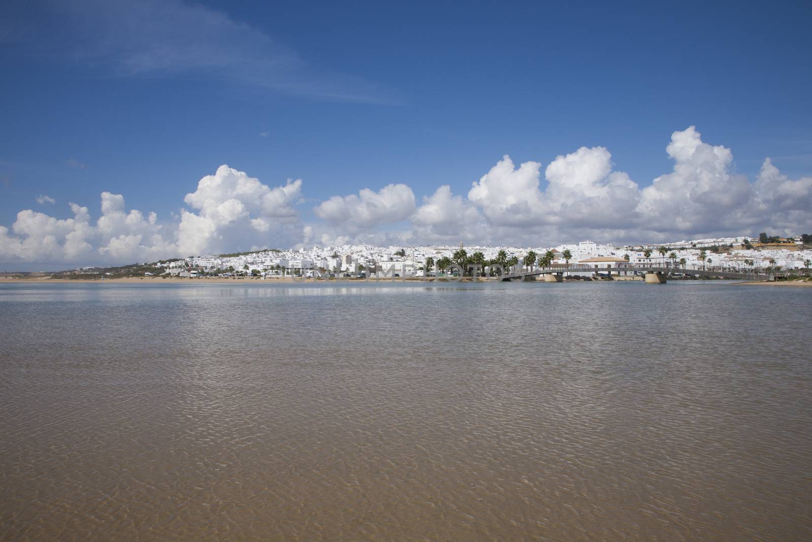 landscape from water of white houses Conil de la Frontera village Andalusia Spain Europe