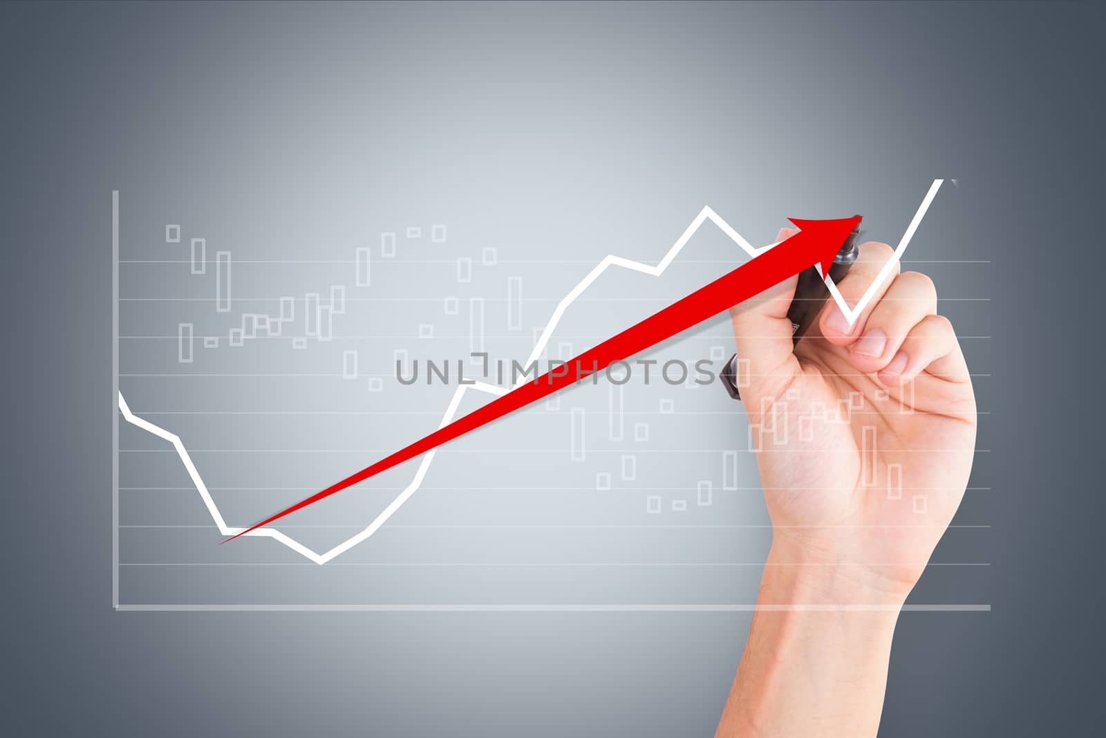 Business and finance concept, young male hand holding pen and drawing graph chart with red arrow on digital screen.