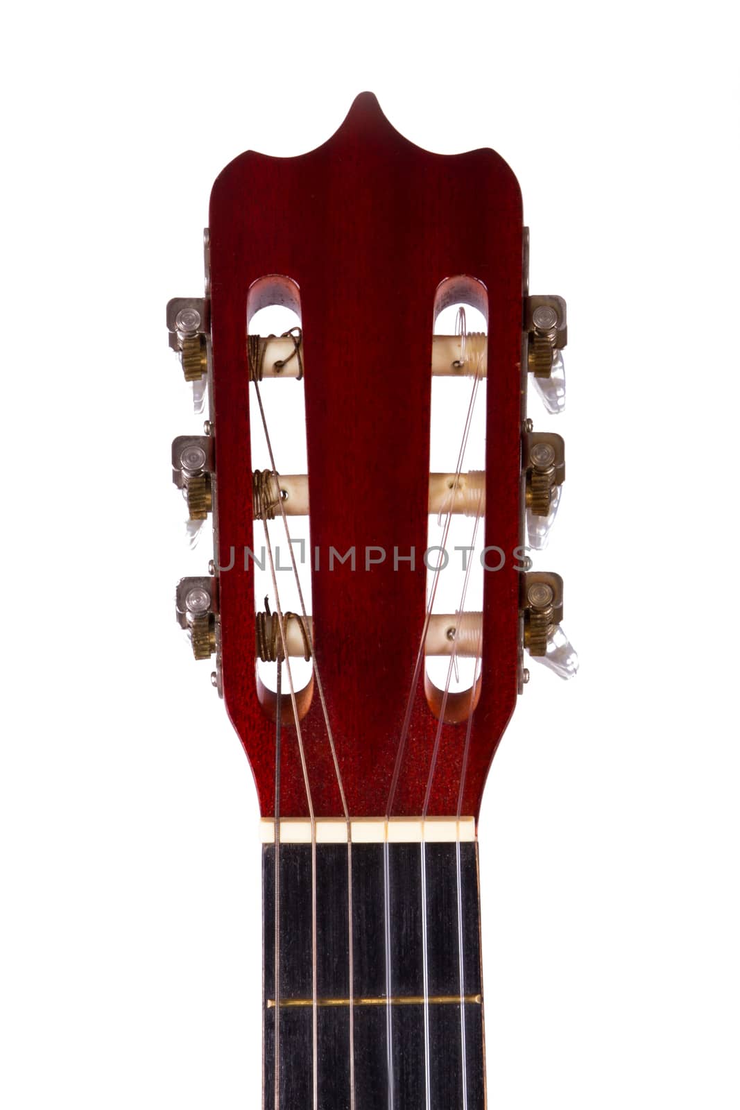 Front view of wooden classical acoustic guitar, isolated on white background.