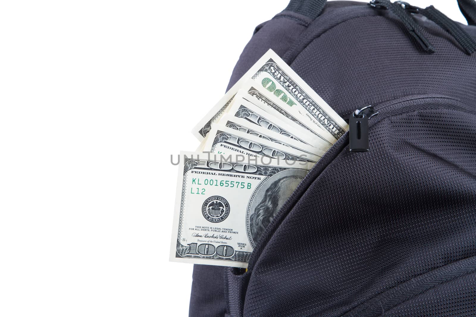 One hundred dollar banknotes in back pack, isolated on white background.