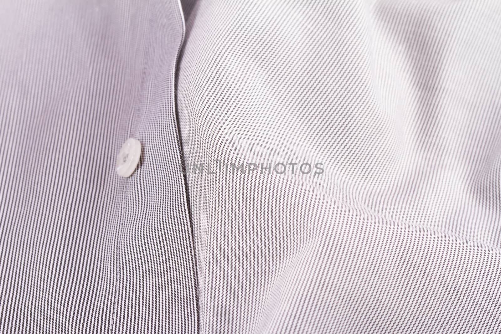 Close up view of shirt button.