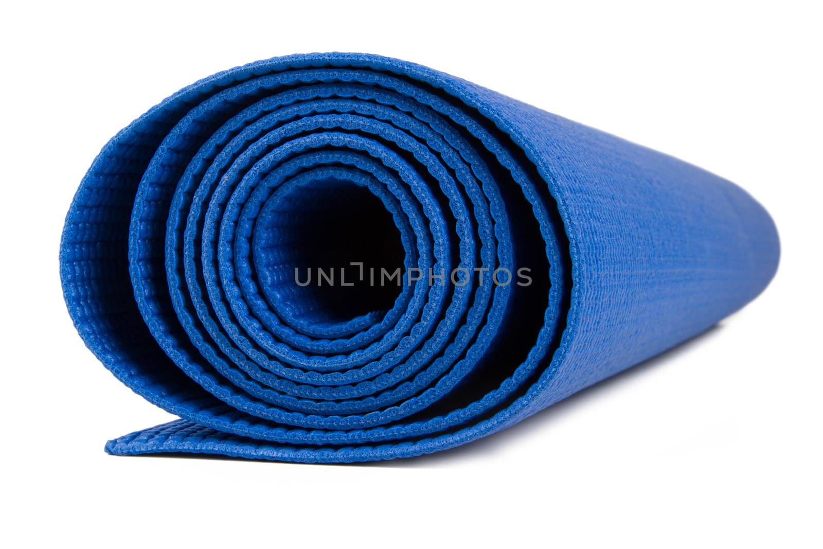 Side view of blue rolled fitness mat, isolated on white background.