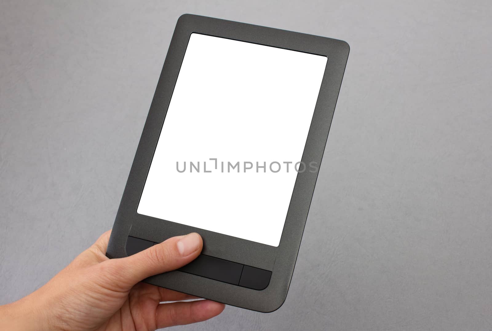 new electronic book in mans hand on grey background