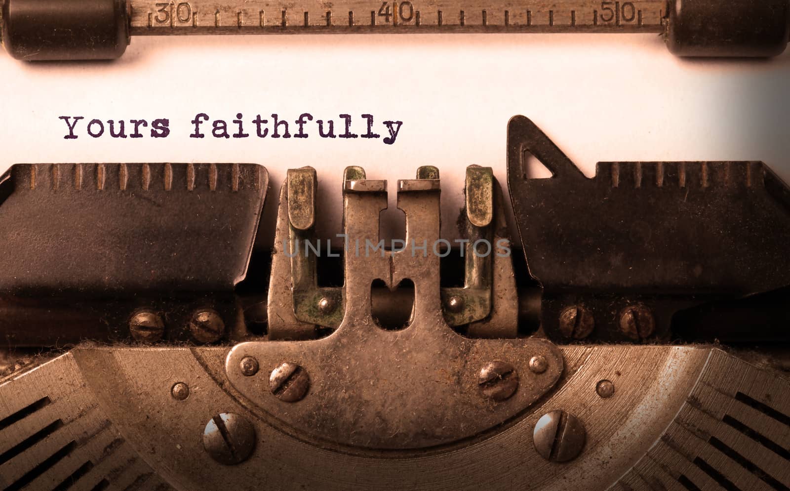 Vintage inscription made by old typewriter, yours faithfully