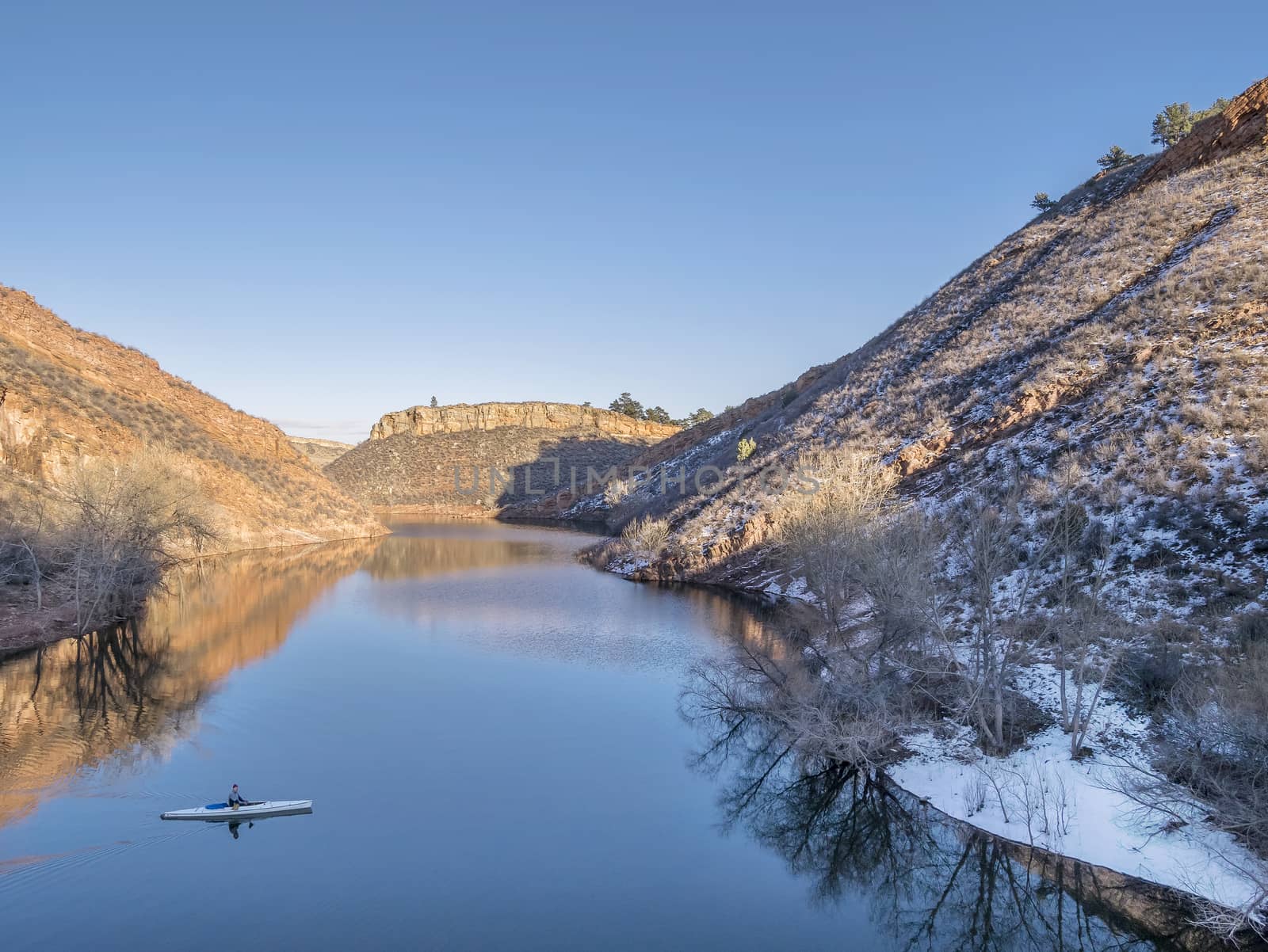 aerial view of canoe on Horsetooth Reservoir near Fort Collins, Colorado, winter scenery with some snow