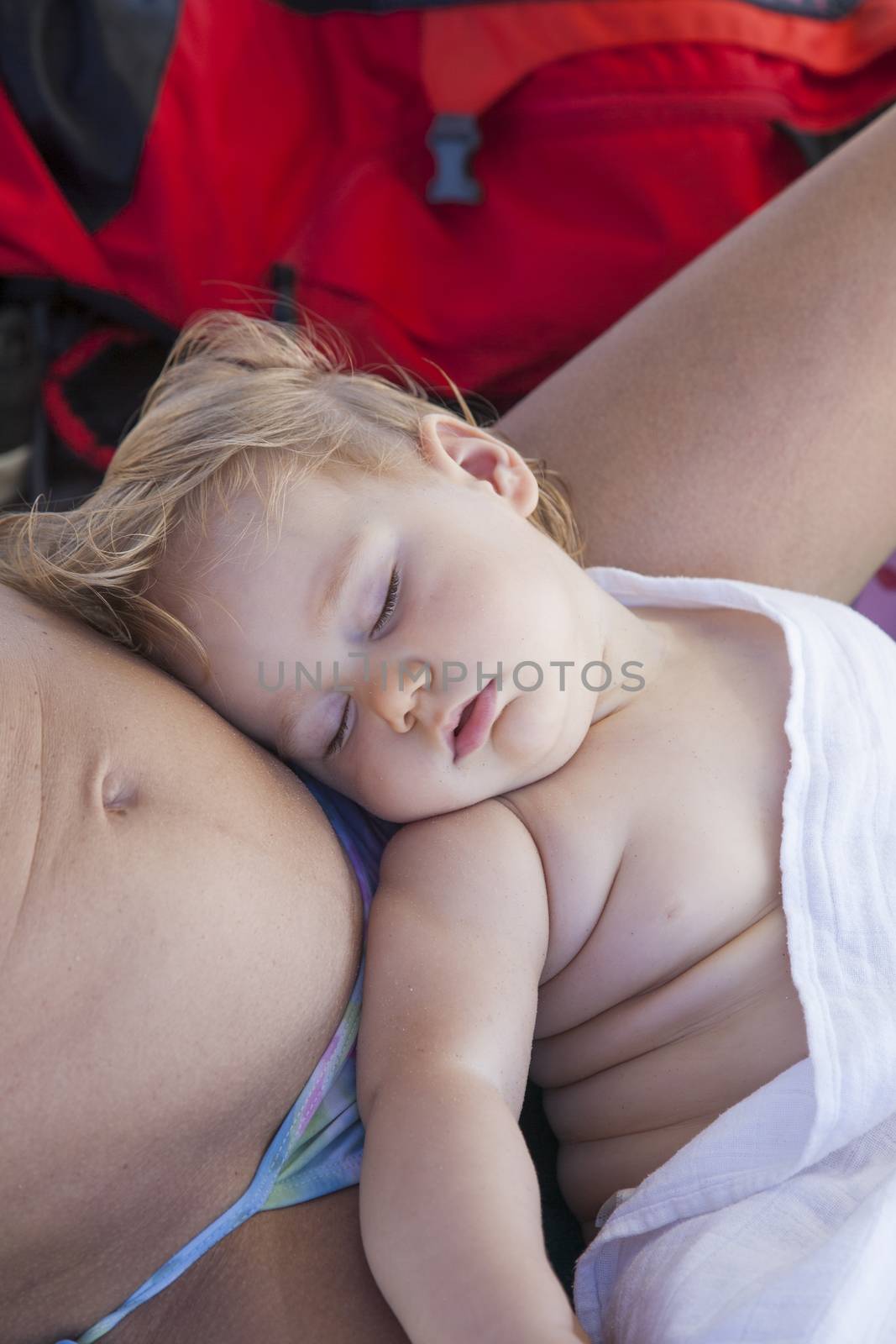 baby sleeping above mom tummy by quintanilla