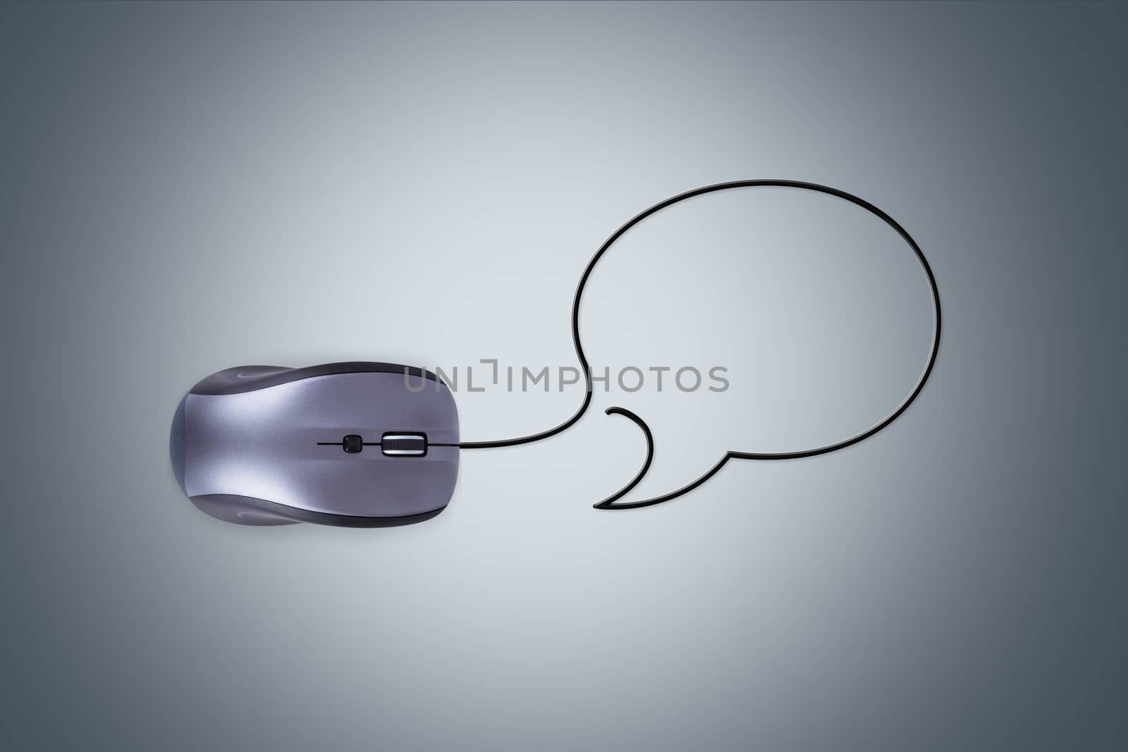 Communication concept, mouse with cable in form of speech bubble over dark background.