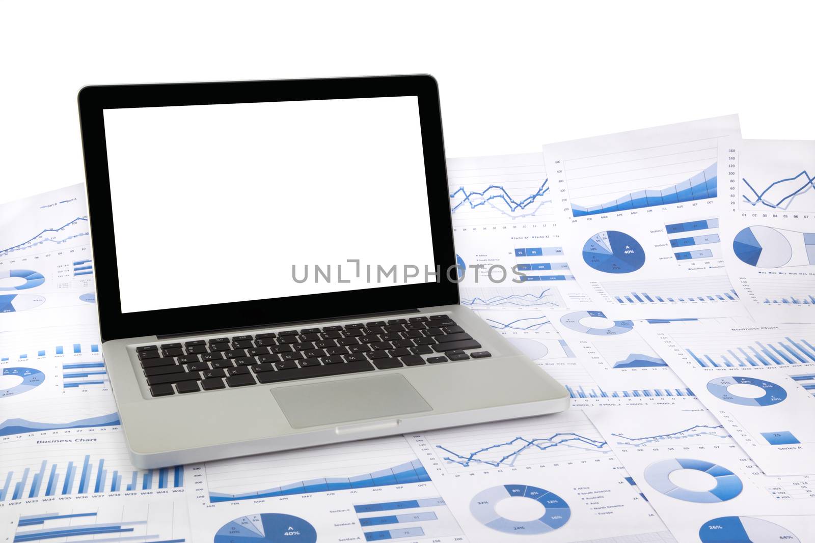 blank laptop on graphs, marketing research summarizing and finan by vinnstock