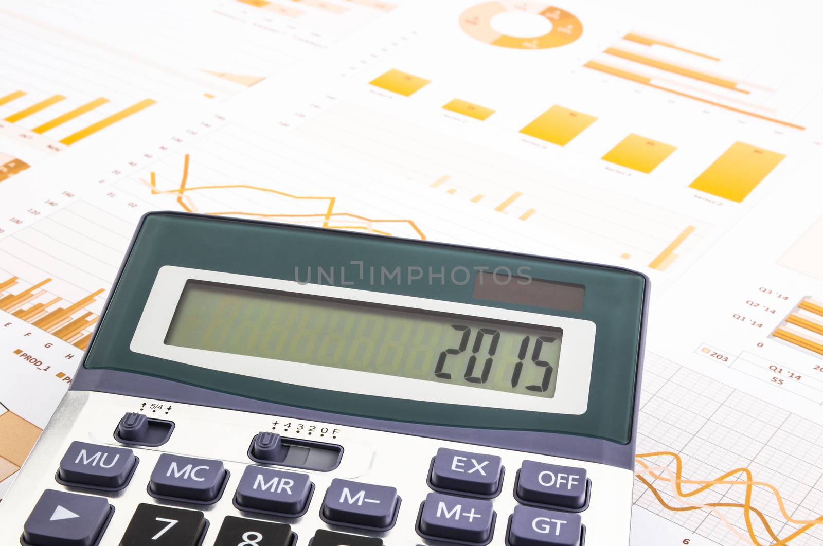 graphs background with 2015 number on calculator  by vinnstock