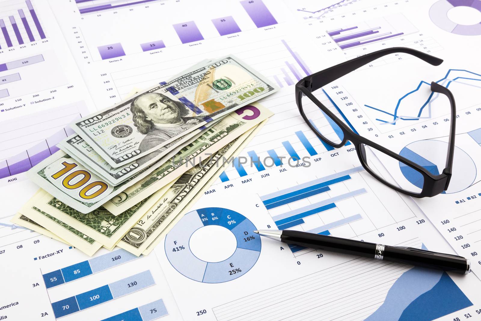 dollar currency on graphs, financial planning and expense report by vinnstock