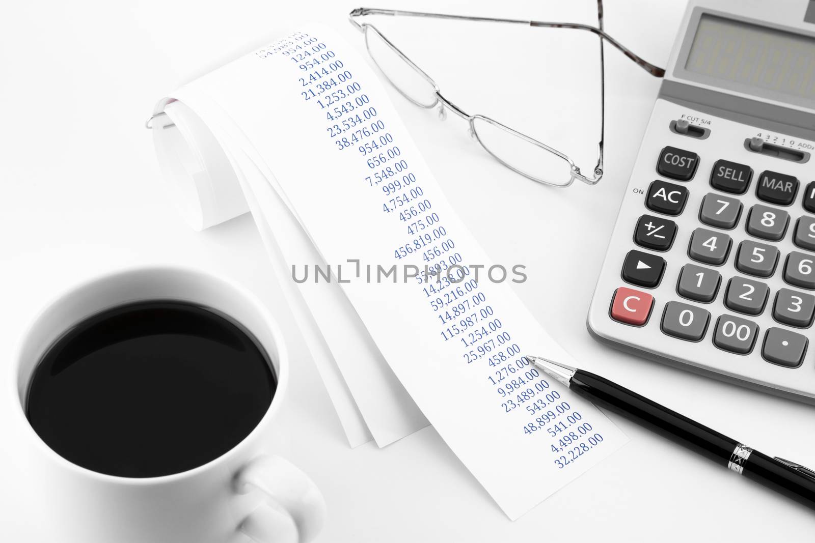 accounting concept with summary purchasing paper rolls on office table in white tone