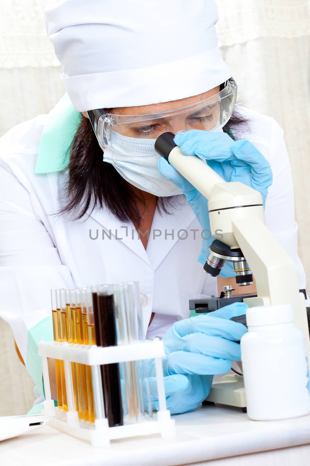 doctor looking at a test tube of yellow solution by Astroid