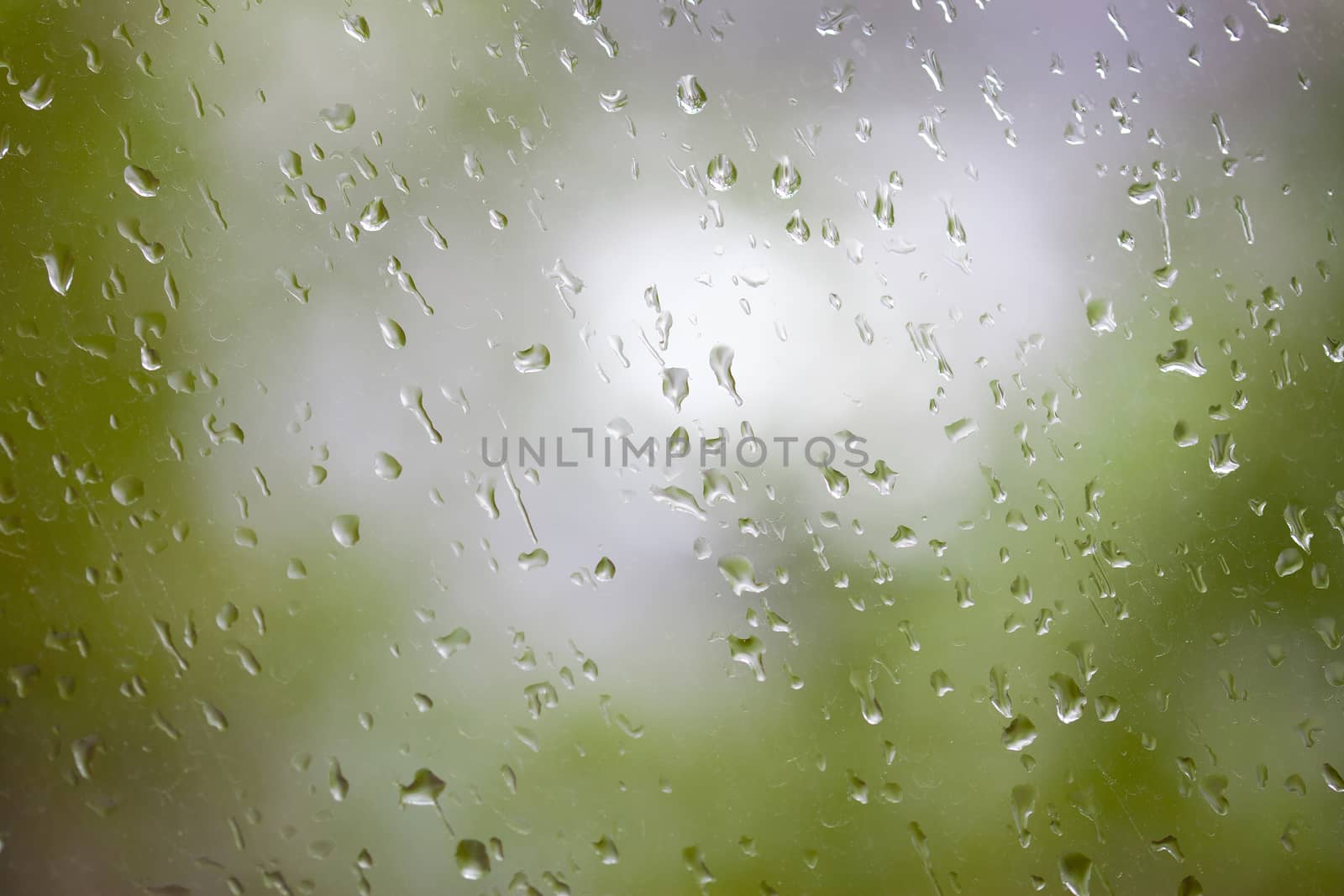 rain drop on glass by Astroid