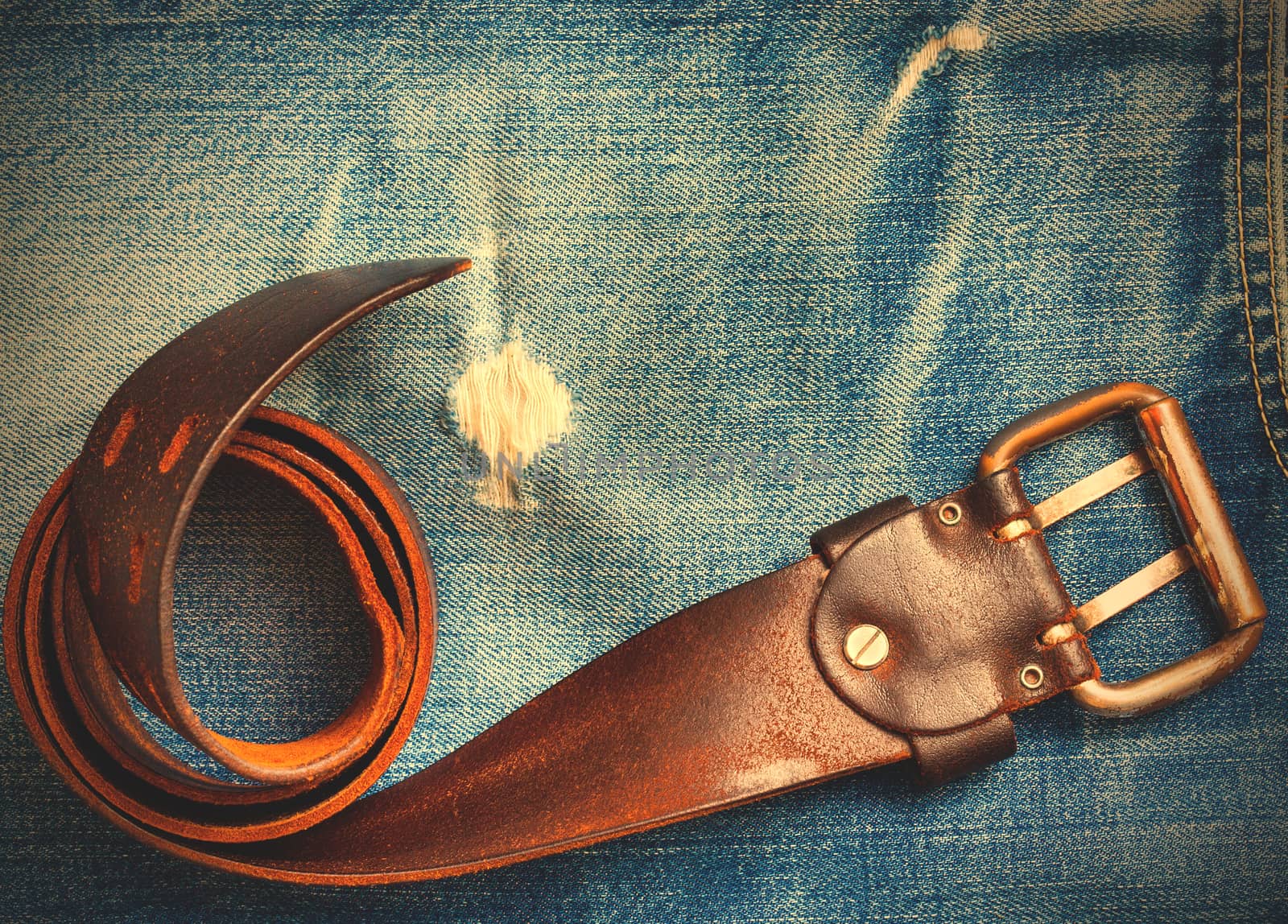 vintage belt on old blue jeans by Astroid