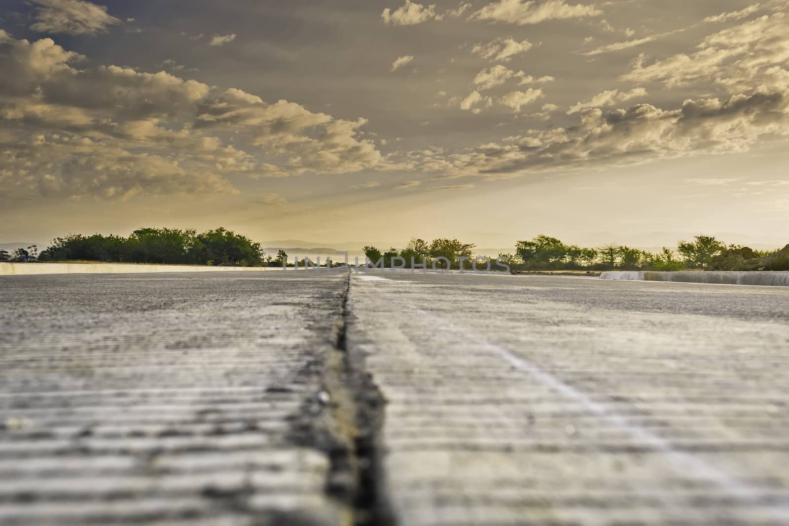 Newly built concrete road leading to a resort, Philippines