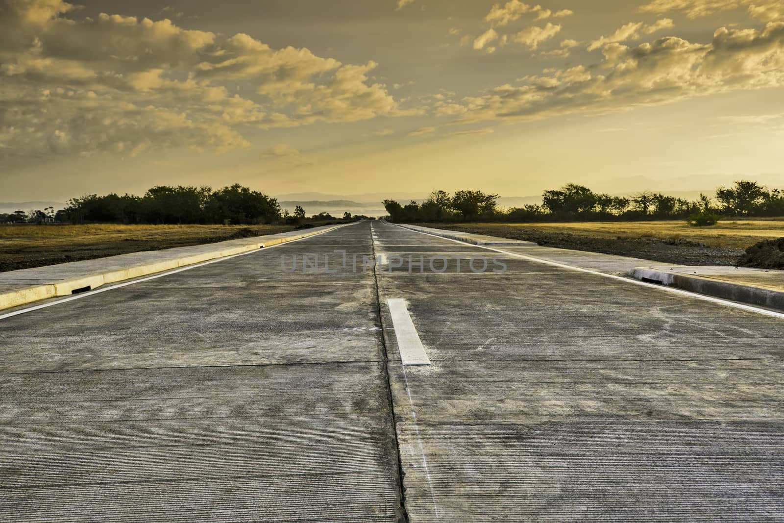 Newly built concrete road leading to a resort, Philippines