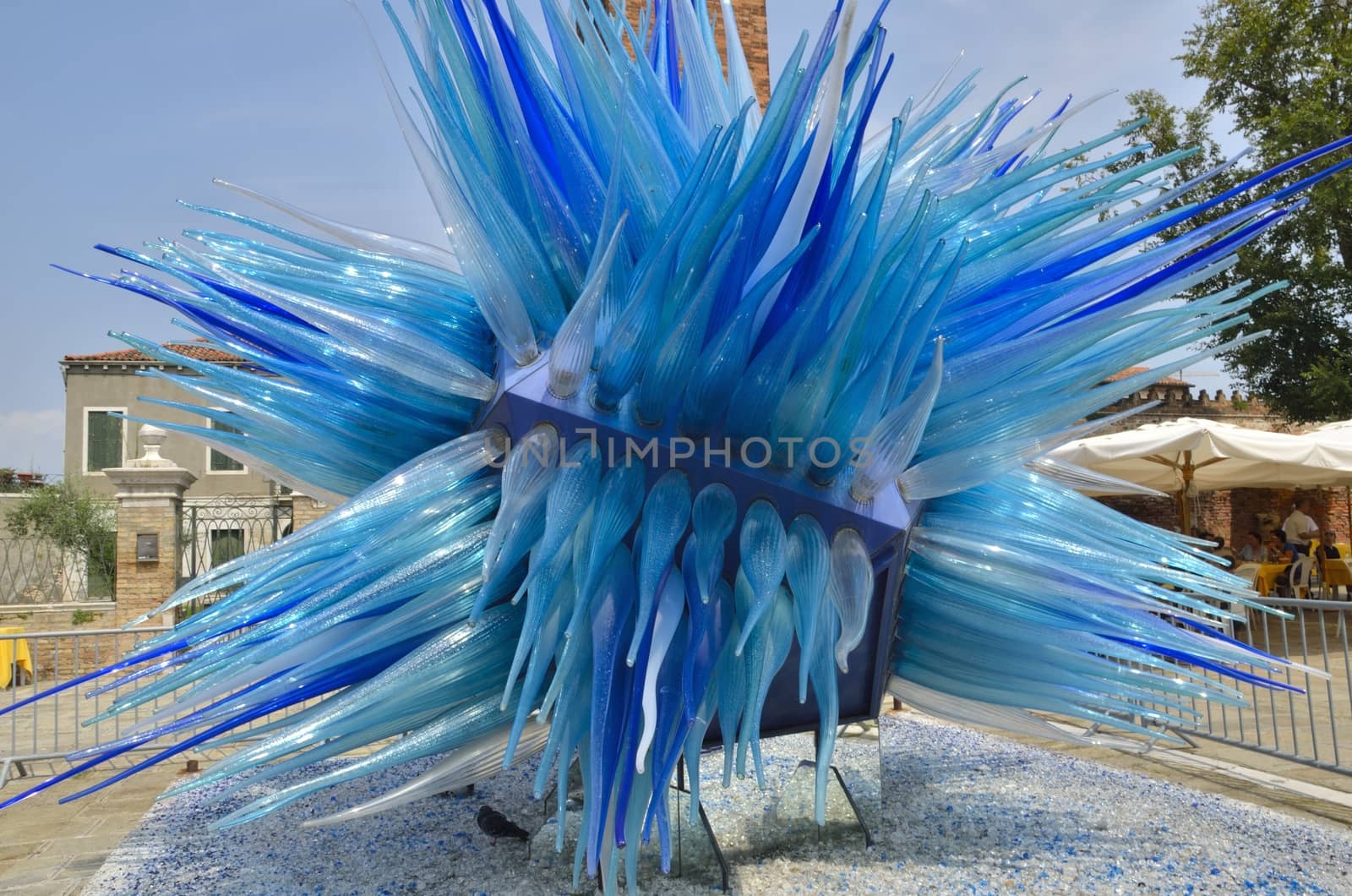 Blue murano glass sculpture  in a sqaure in Murano, Venice, Italy.