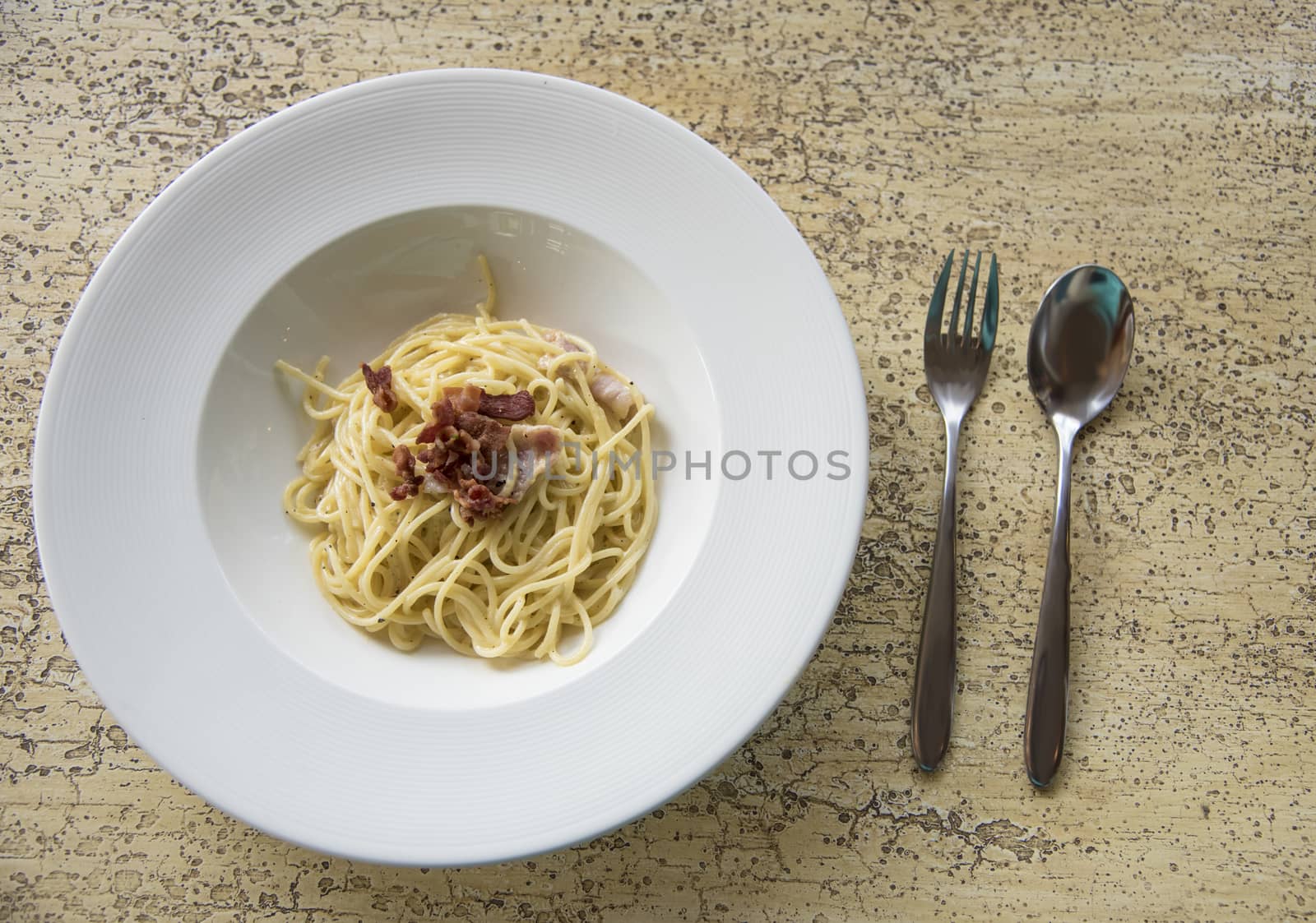 Spaghetti with becon on table, Cuisine by pixbox77