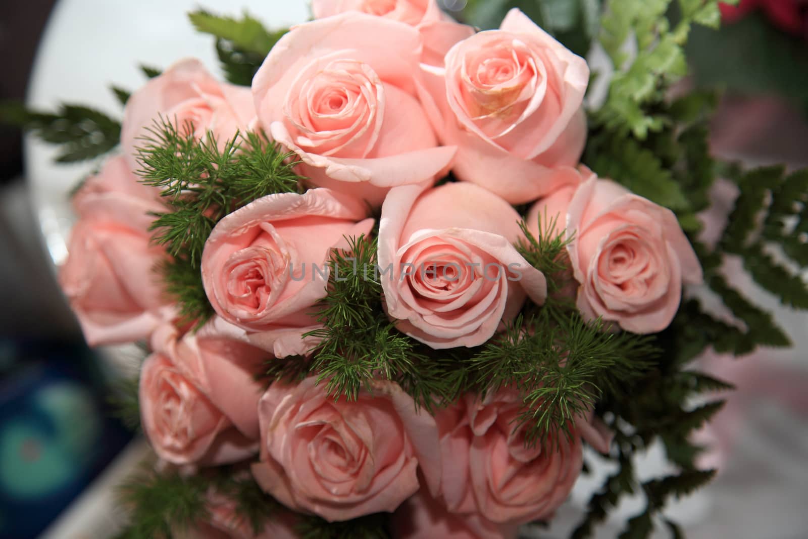 close up of wedding bouquet with roses