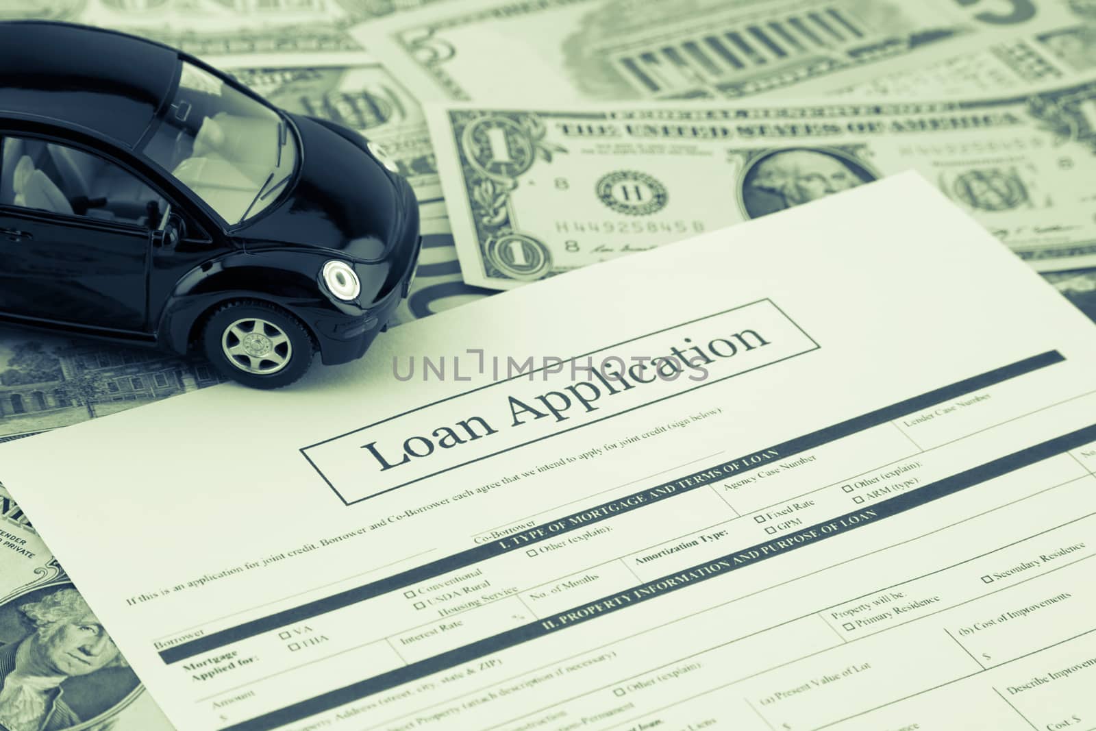 Blank loan application form with car model and money: dollar banknotes on background, Sepia toned