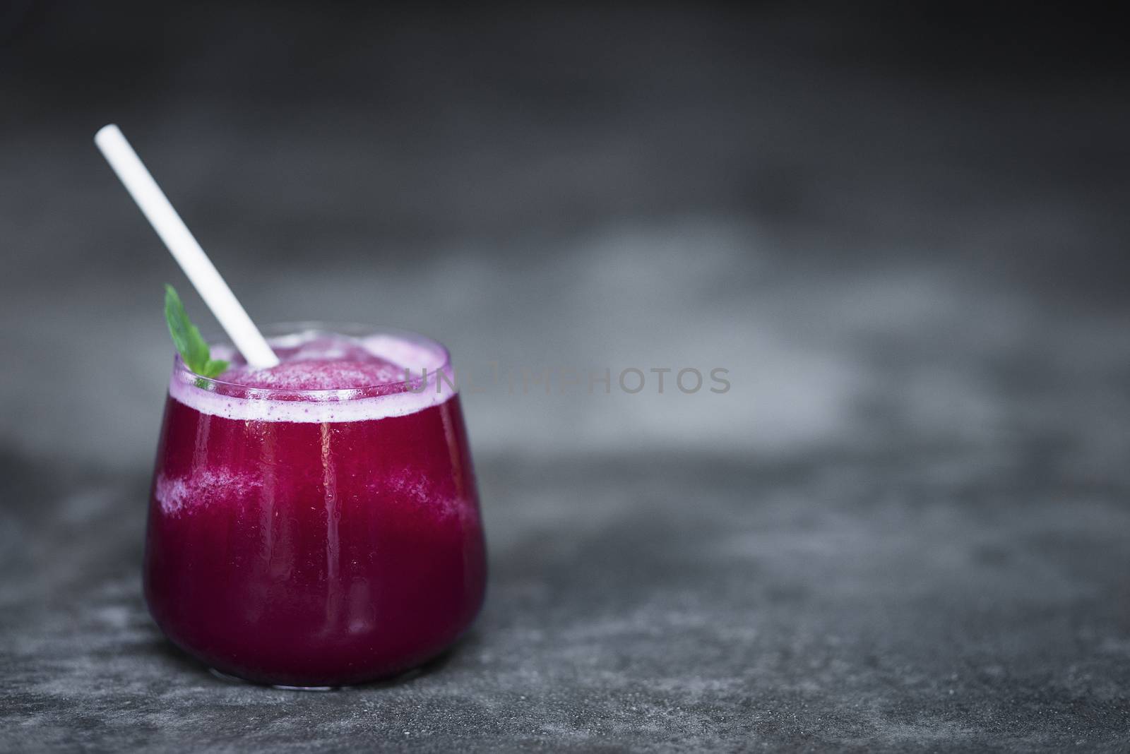 beetroot juice in glass by jackmalipan