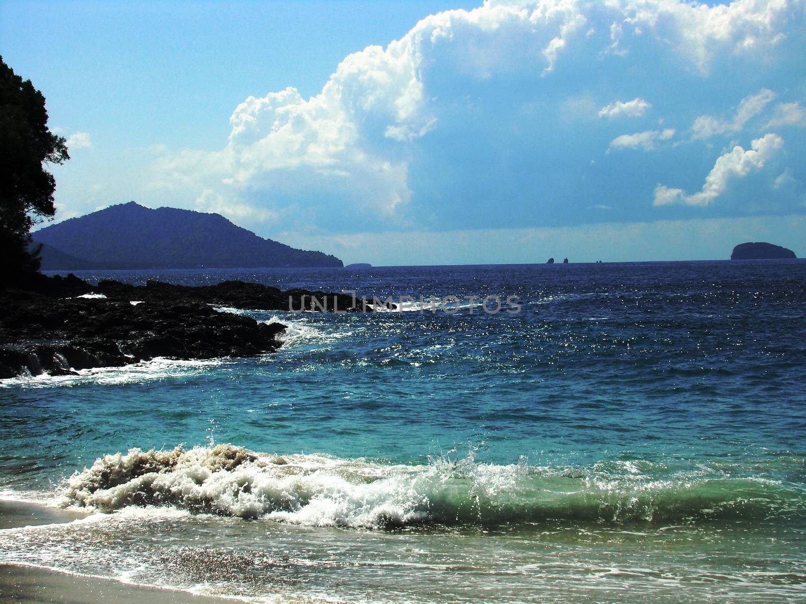summer seascape on background of blue sky
					