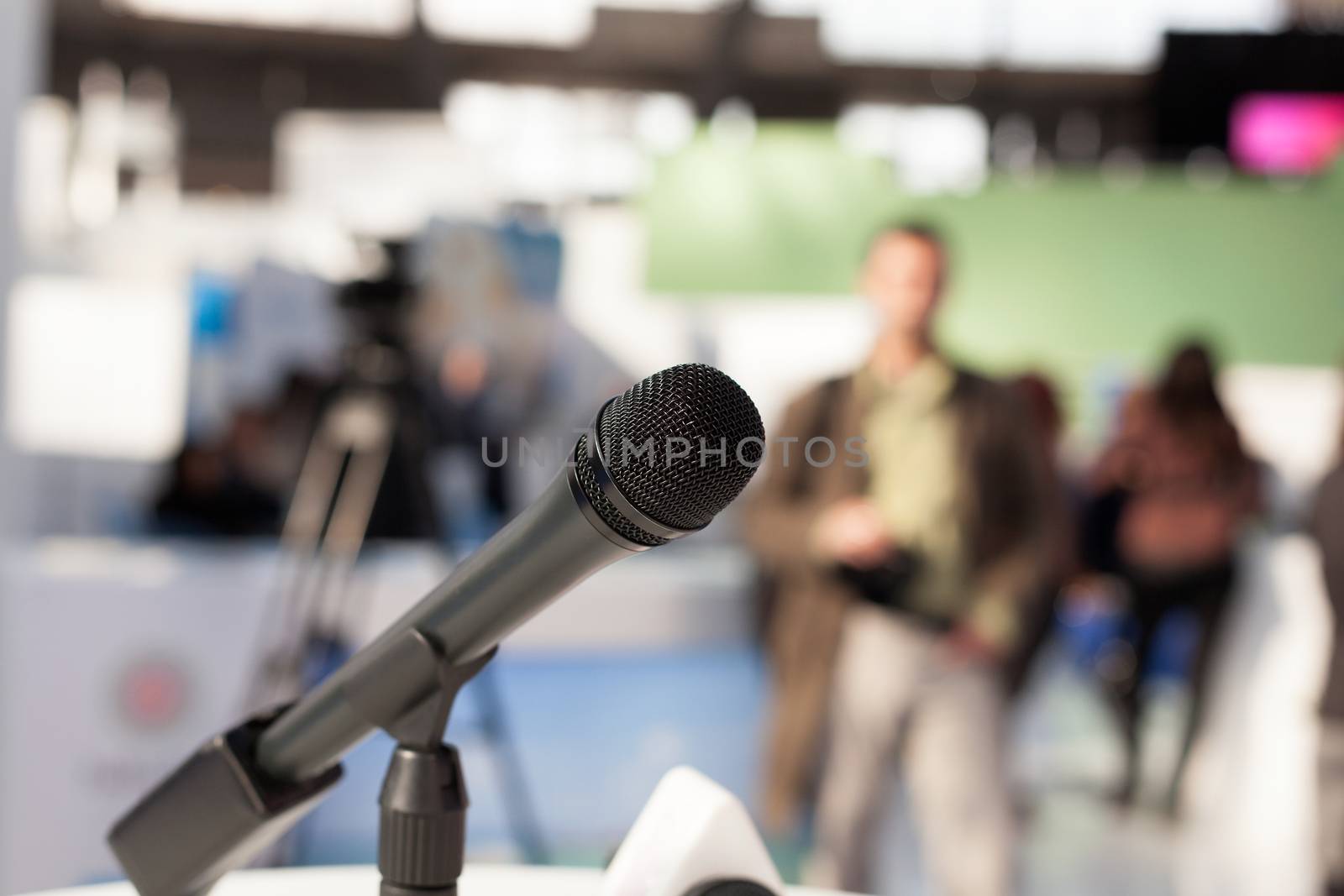 Microphone in focus against unrecognizable person