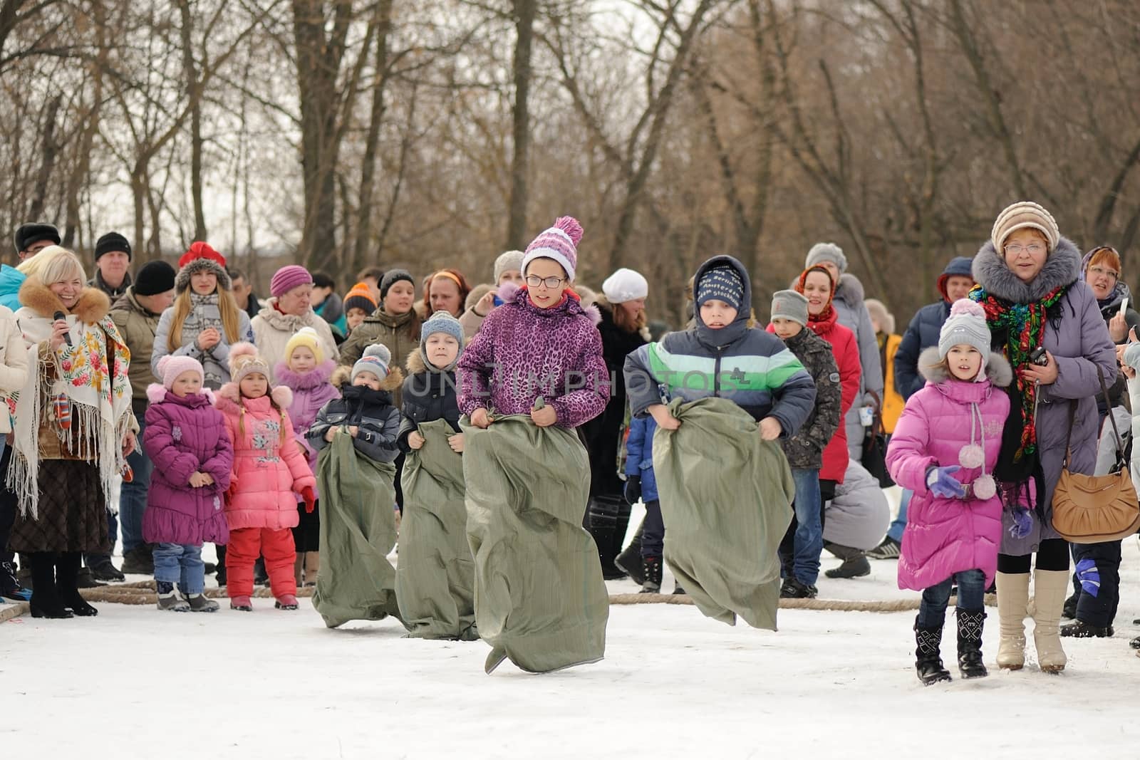 Sack-race during winter Maslenitsa 2015,  carnival in Russia