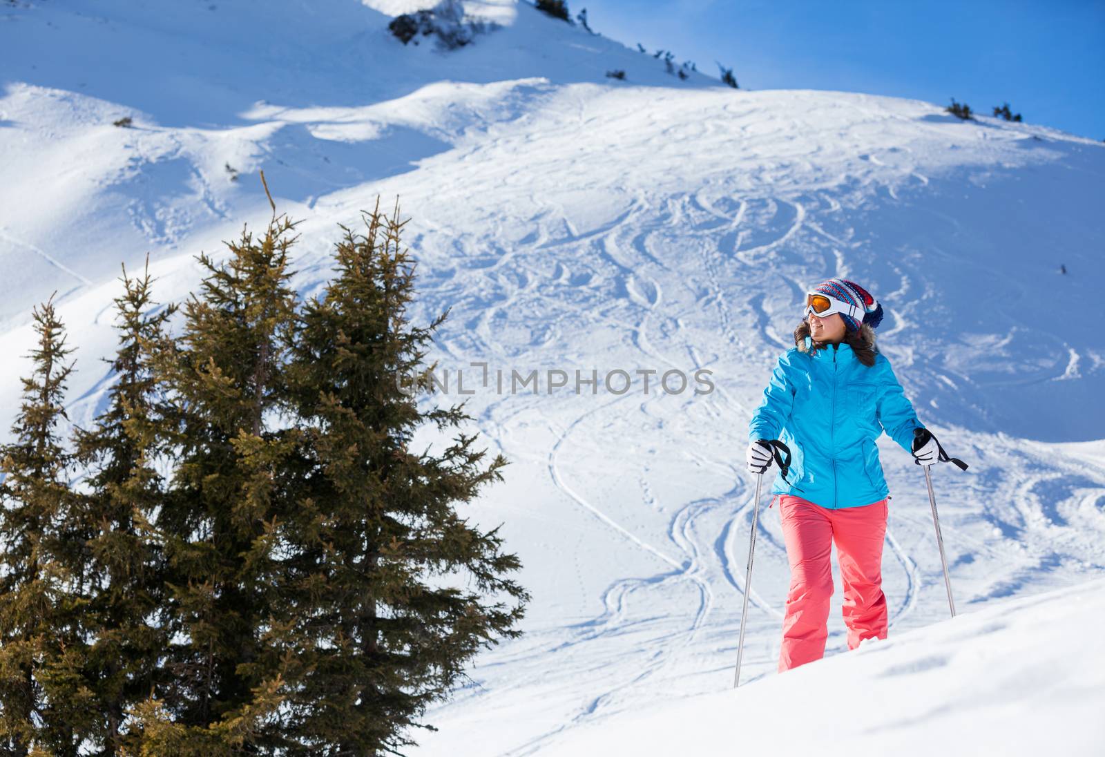 Ski, winter, snow, skiers, sun and fun - Middle Aged Woman On Ski Holiday In Mountains