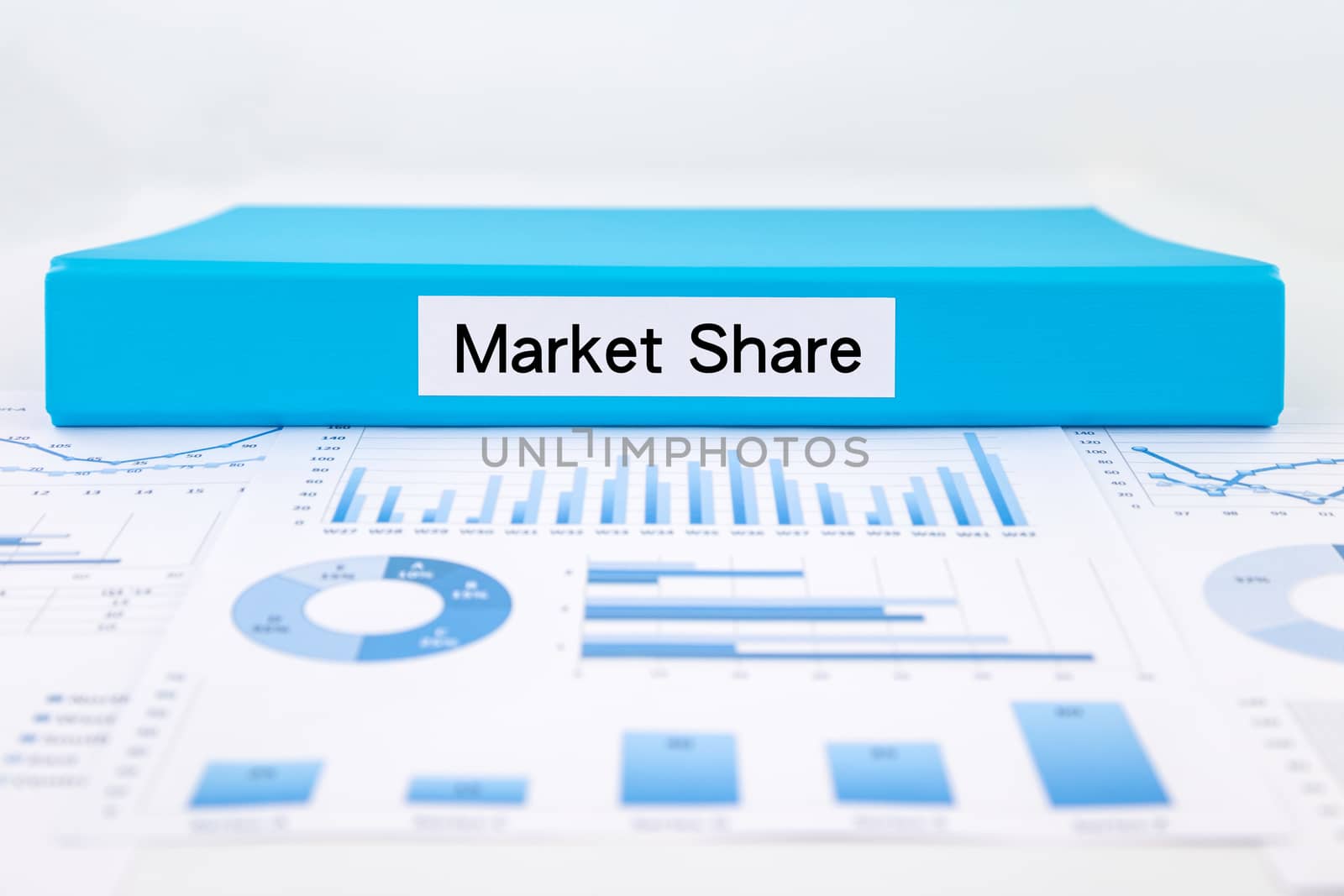 Market Share concept with graphs, charts and business report by vinnstock