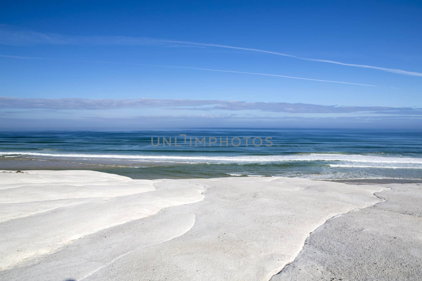 Landscape view of a beach with an amazing blue sky