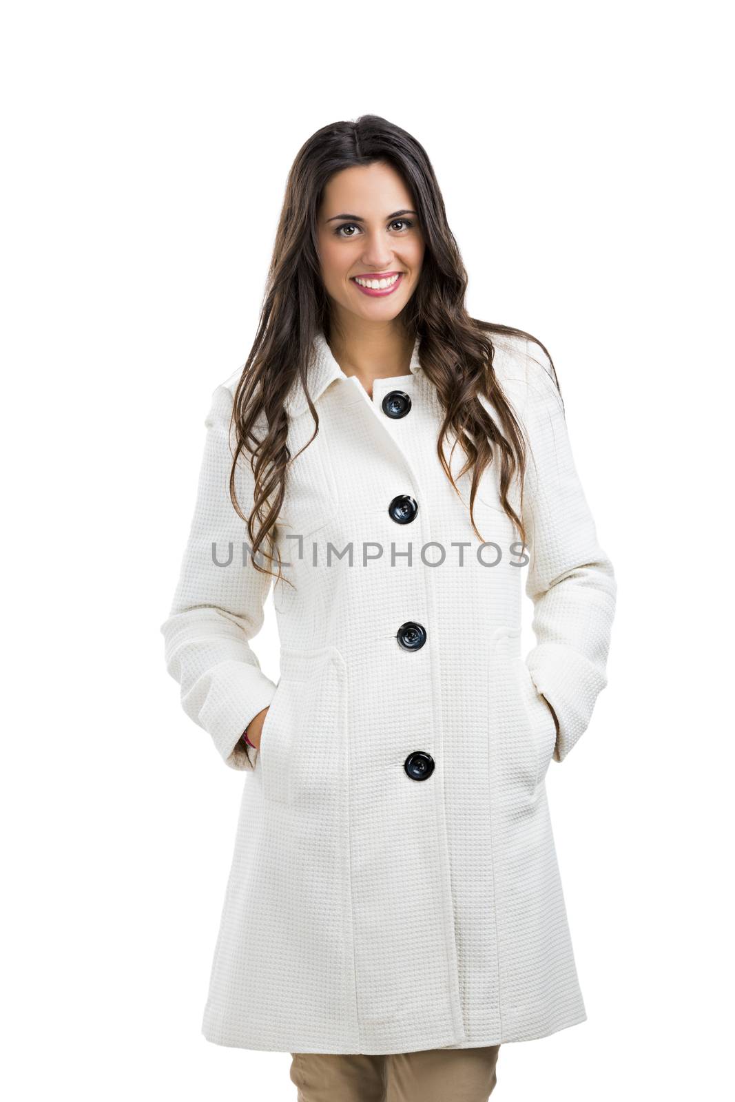 Beautiful woman posing using a winter coat