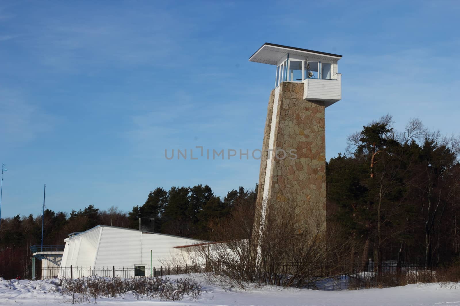 Rescue station with a tower on a winter beach