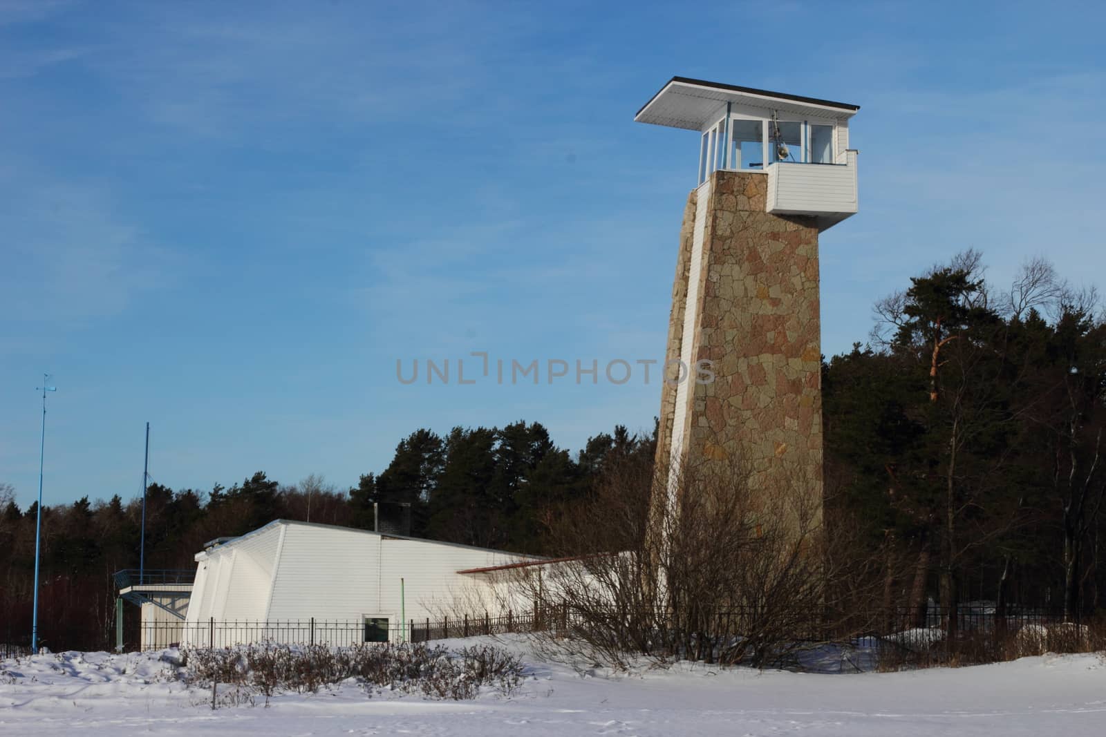 Rescue station with a tower on a winter beach