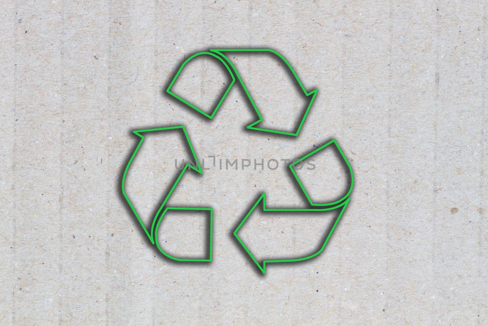close-up Grey cardboard Paper Background with detail texture, macro, with green sign of recycle
