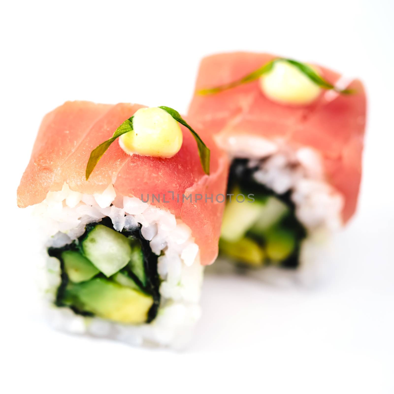 traditional fresh japanese sushi rolls on a white background