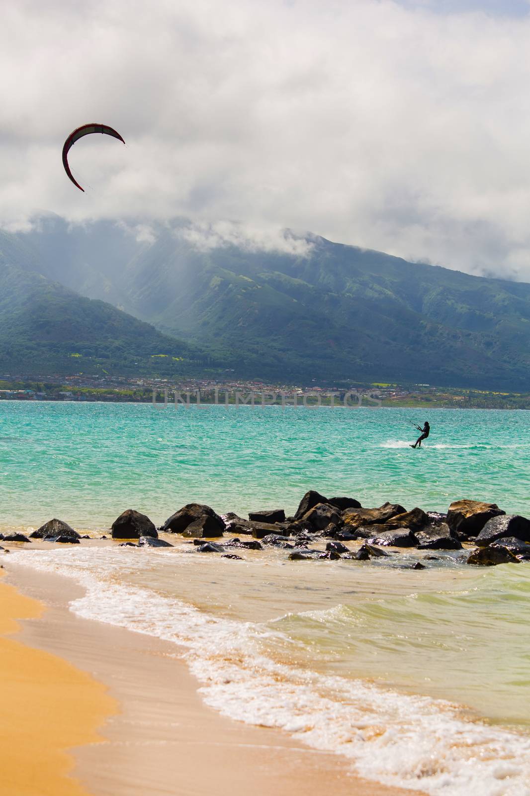 Maui kite surfer on shore at Kanaha Beach Park