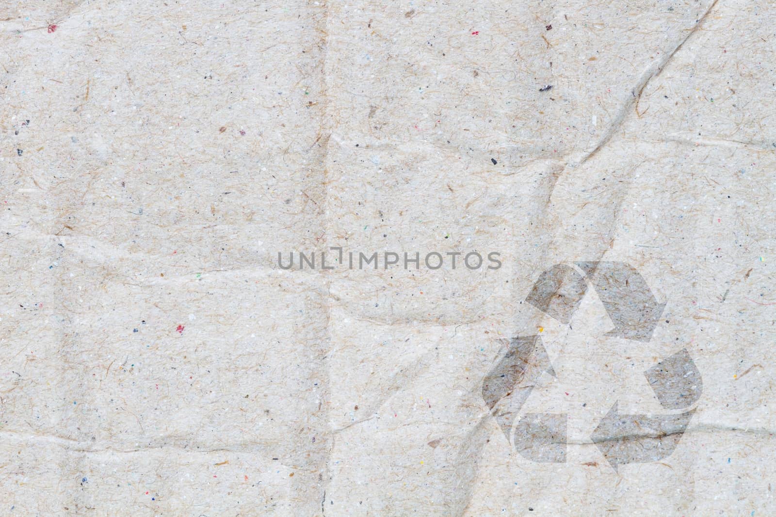 Old vintage cardboard paper texture or background,  with symbol of recycle on the below corner