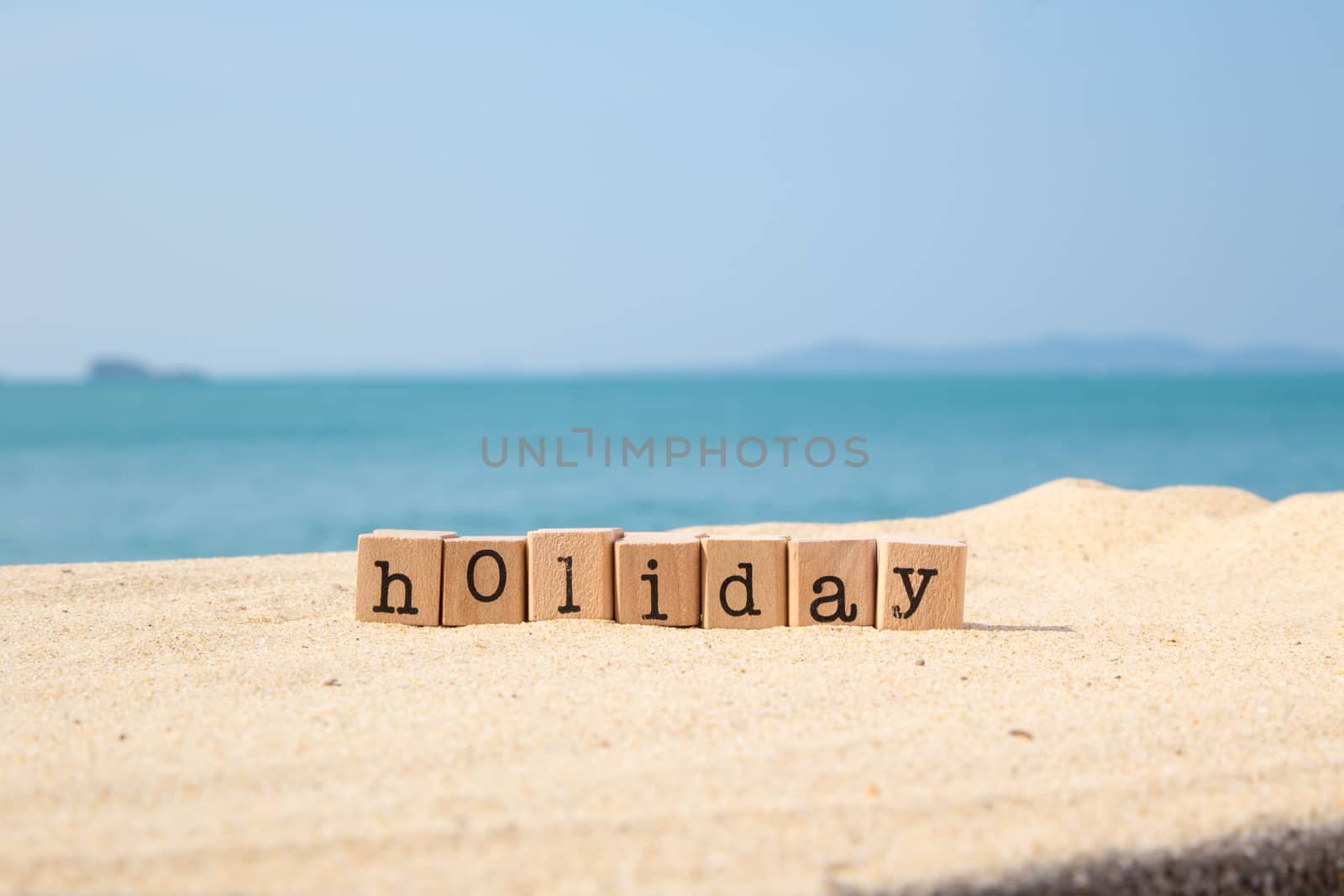 Holiday season sign and beautiful sunny sea view  by vinnstock