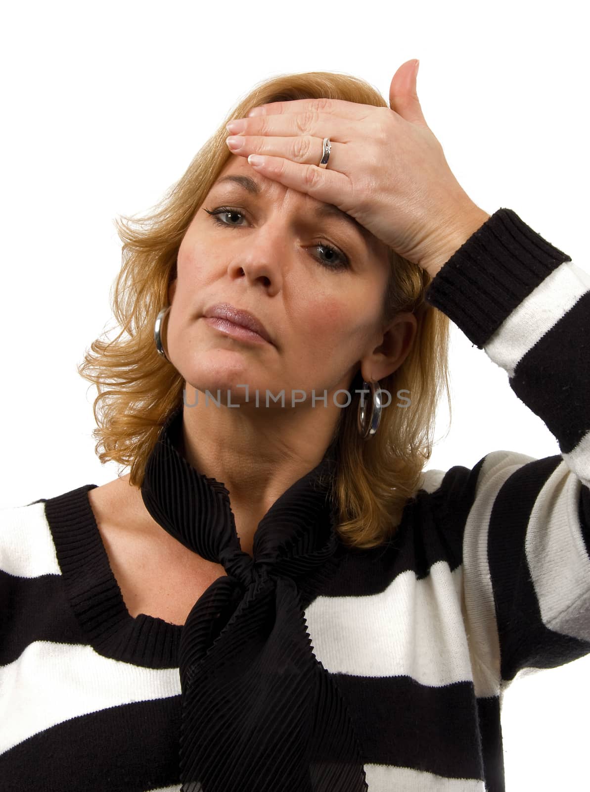 woman feeling sick is holding hand on head over white background